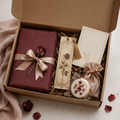 Romance Reader Gift Box with wrapped mystery book and bookish gifts